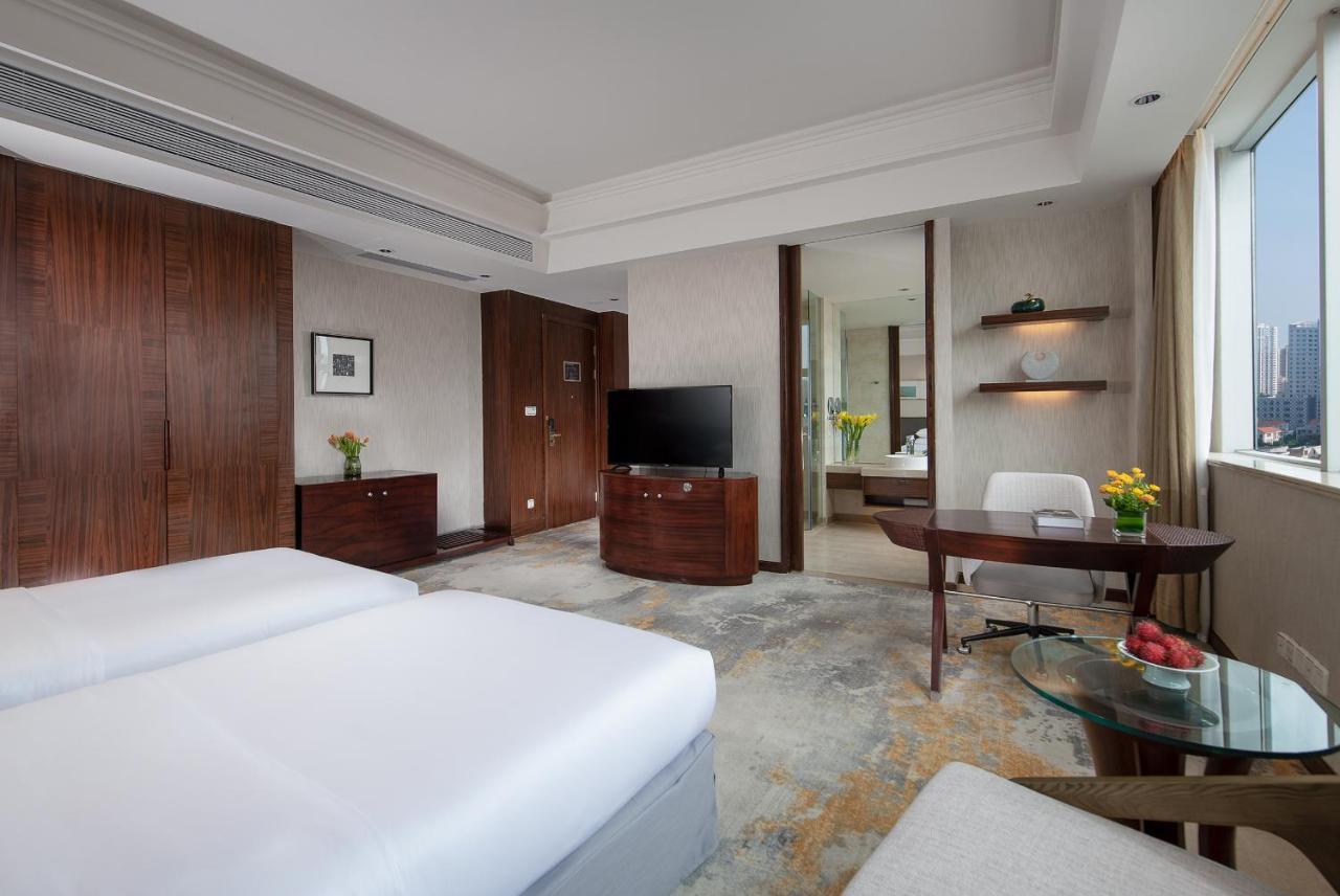 Golden Shining New Century Grand Hotel เป๋ยไห่ ภายนอก รูปภาพ